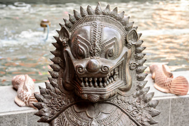 istock A statue of a dragon with a mouth open and teeth showing 2155503369