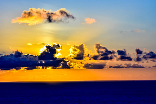 istock The sky is filled with clouds and the sun is setting 2155503419