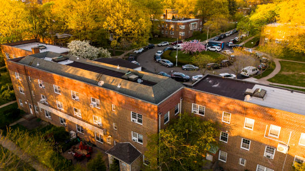 istock Kew Gardens in Queens, NY at dusk: apartment complex is bathed in the light 2155509725