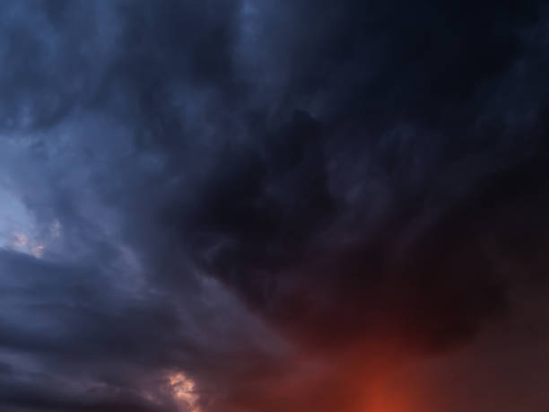 istock Dramatic sky with storm clouds at dusk showing intense warm and cool tones 2155511705