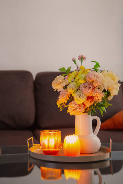 istock summer bouquet in home interior with burning candles 2155519619