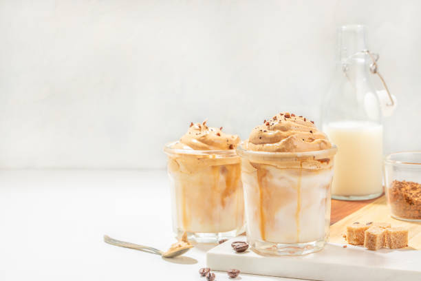 istock Dalgona whipped, instant, cream coffee on a light background. trendy and popular drink 2155520690