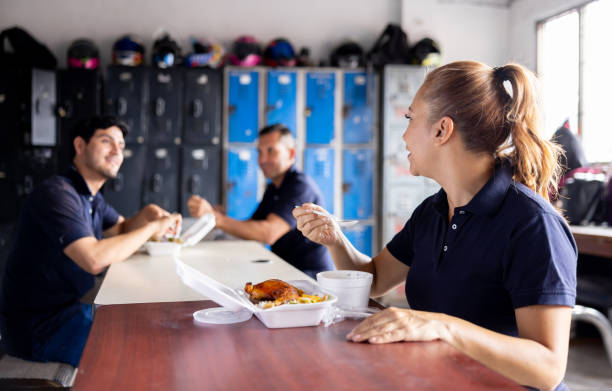 Group of blue-collar workers eating in their lunch break