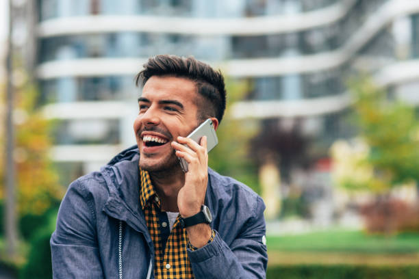 istock Young man talking to the phone 2155521117