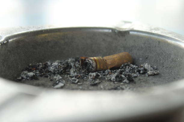 istock The cigarette butts are placed in the ashtray 2155523212