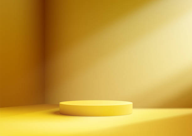 istock A vibrant yellow podium illuminated by a soft, warm light in a minimalist room with a smooth gradient background 2155524984