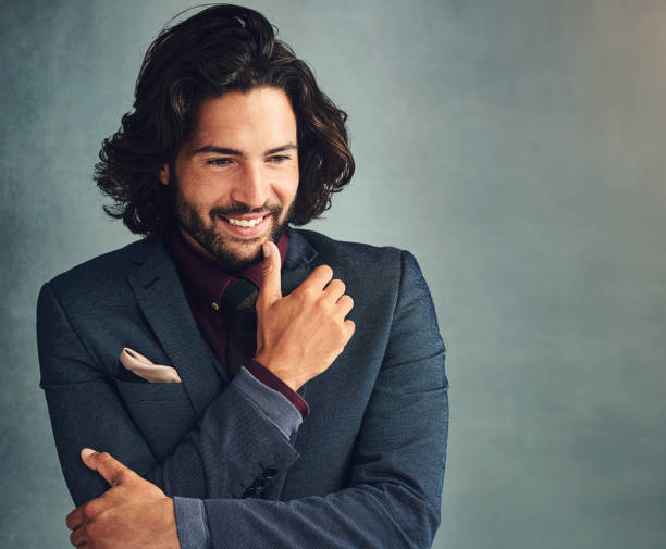 istock Smile, thinking and business man with idea, planning future and salesman problem solving isolated on studio background. Decision, inspiration and entrepreneur with vision, dream and remember memory 2155528916
