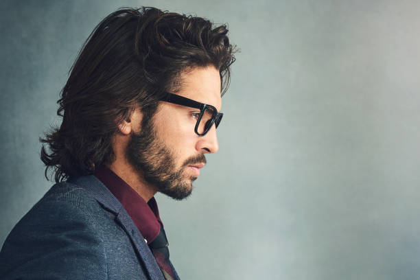 istock Face, profile and thinking with man on studio gray background with space for decision or choice. Glasses, mockup and solution with business person in suit for contemplation or problem solving 2155528917