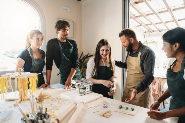 istock People are making homemade ravioli during a cooking class 2155528929
