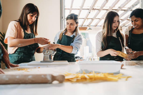 istock People are having fun together during a cooking class to learn how to make homemade pasta 2155529002