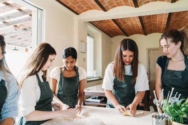 istock People are having fun together during a cooking class to learn how to make homemade pasta 2155529004