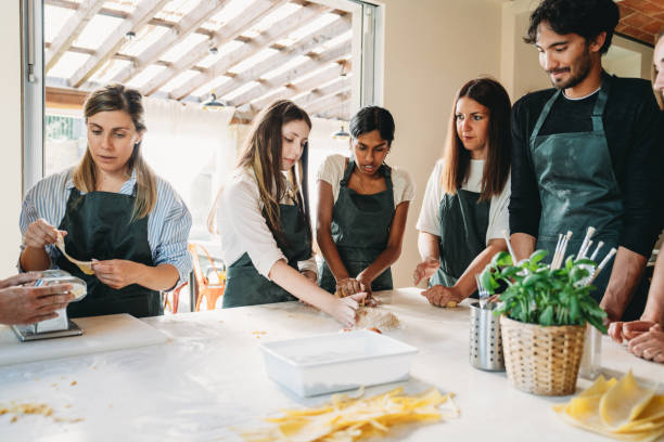 istock People are having fun together during a cooking class to learn how to make homemade pasta 2155529009
