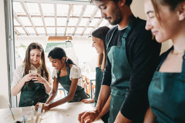 istock Friends are enjoying a cooking class together 2155529015