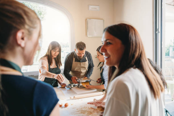istock People are enjoying a cooking class together 2155529022