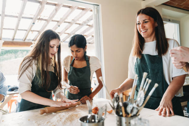 istock People are enjoying a cooking class together 2155529025