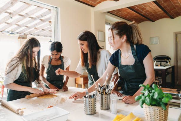 istock People are enjoying a cooking class together 2155529028