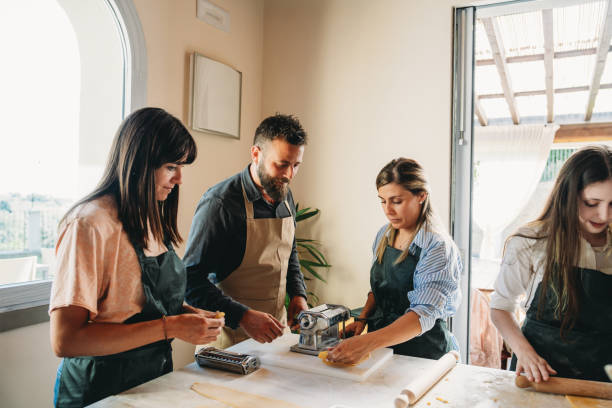 istock People are enjoying a cooking class together 2155529029