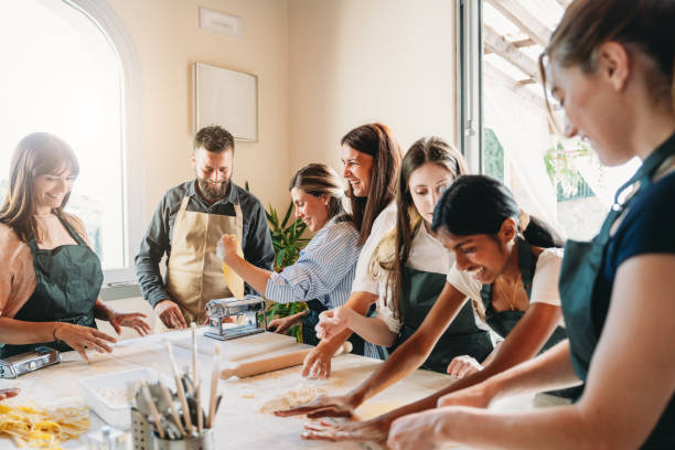 istock People are enjoying a cooking class together 2155529033