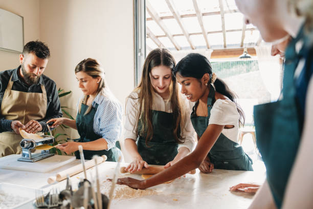 istock People are enjoying a cooking class together 2155529034