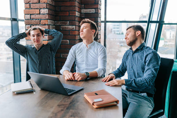 istock Three colleagues experiencing a loss and disappointment in their business project 2155530597