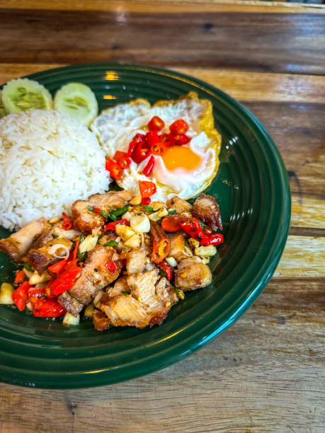 istock Crispy Pork with Chili Garlic and Salt with fried egg 2155532501