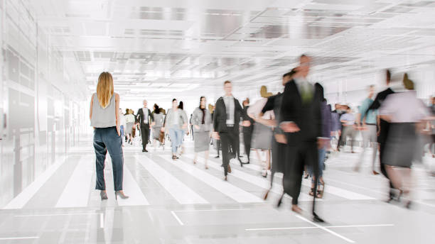 istock Motion blur of walking commuter during the rush hour 2155533265