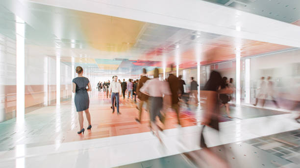 istock Motion blur of walking commuter during the rush hour 2155533503