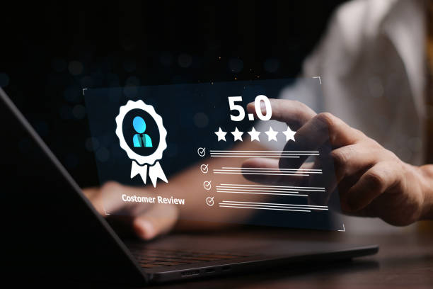 istock Businessman using laptop give rating to service experience on online application. 5-star satisfaction. satisfaction feedback review. 2155543304