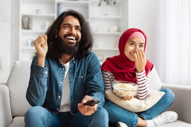 istock Cheerful Couple Enjoying a Comedy Show Together 2155546396
