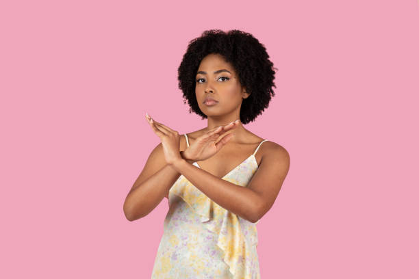 istock Young African American woman gesturing stop with hands 2155546674