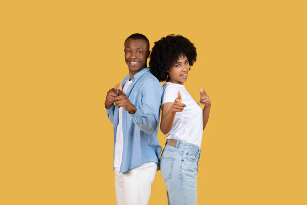istock Back to back couple giving thumbs up 2155546806