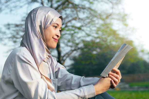 istock Reading or Writing outdoor during summertime 2155549193