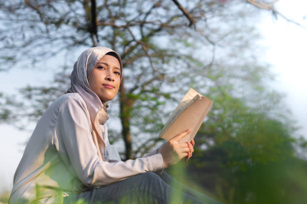istock Reading or Writing outdoor during summertime 2155549250