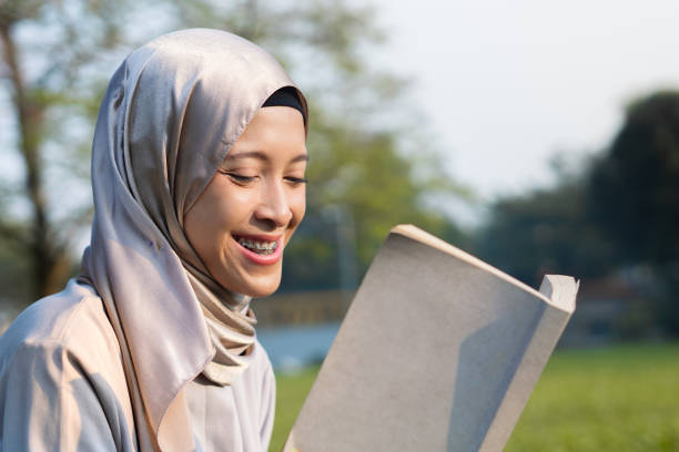 istock Reading or Writing outdoor during summertime 2155549307
