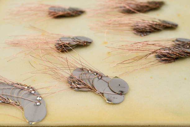 istock Piezoelectric diaphragm with wires recently soldered. Specialized industry. 2155550876