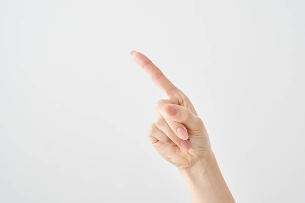 istock A woman's index finger pointing diagonally upwards 2155553222