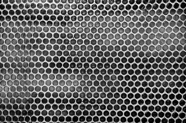 Black-and-white concept bubble pack with a lot of circles sometimes not perfectly shaped