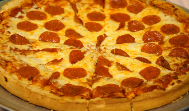 istock close up on fresh baked pepperoni pizza 2155555440