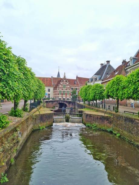 istock River dam in city canal 2155556650
