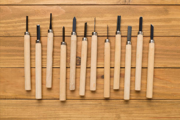 Carpenter tools on wooden background,top view