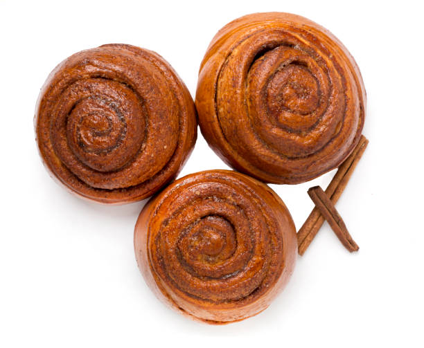 istock Sweet cinnamon rolls isolated on white ,top view 2155560072