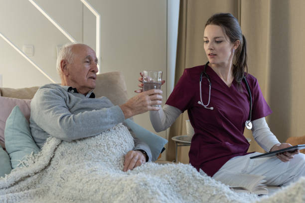 istock A young female doctor visiting a patient at home 2155560248
