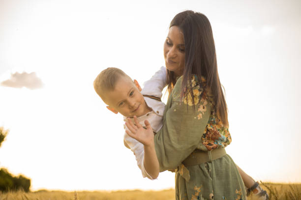 istock Single mother enjoying nature with son 2155561546