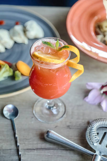 A table showcasing a variety of delectable food and refreshing drinks.