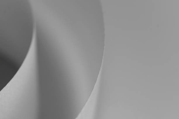 istock Abstract background of white satin ribbons 2155564911