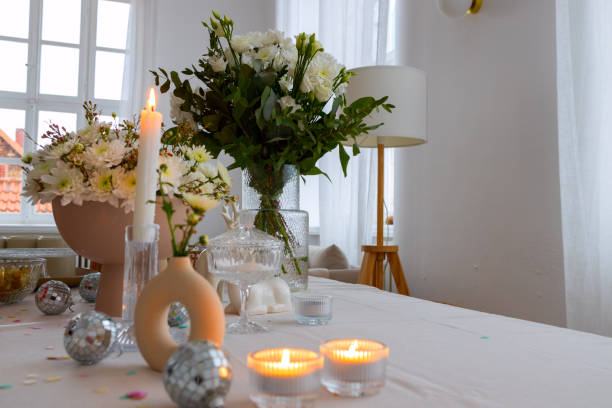 istock Vase with white flowers, mirror ball, selective focus 2155570025