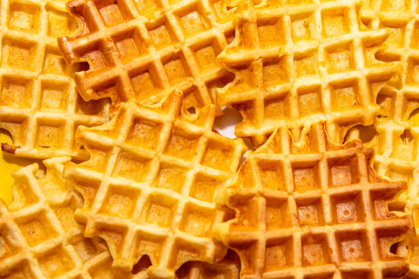 Plate of delicious waffles up close. Venetian waffles background