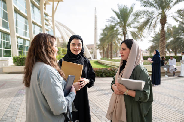 istock Small group of female university student friends talking together 2155573458