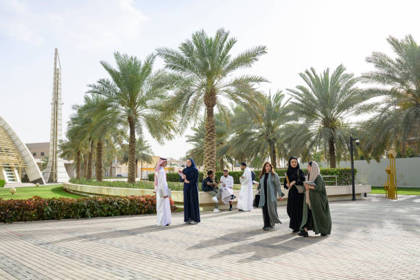 istock There female friends arrive at coeducational university in Riyadh 2155573478