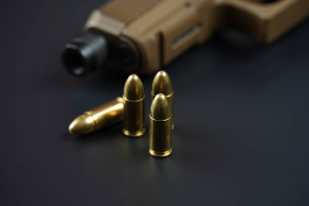 9mm handgun and bullets \n\nThe Taurus PT809 is a 9x19 mm semi-auto pistol.